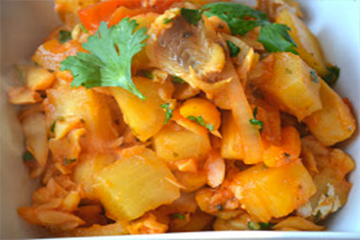 Puerto Rican fish stew with potatoes, tomatoes, and onions